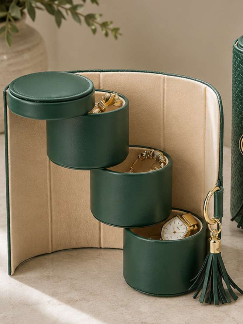 Compact jewelry organizer neatly storing rings, necklaces, and earrings for travel or daily use